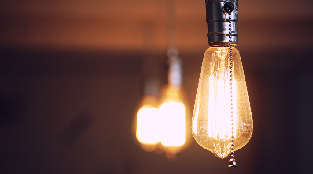 Three hanging light bulbs